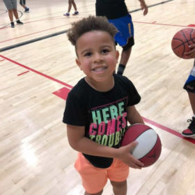 South End Community Center - young boy with basketball